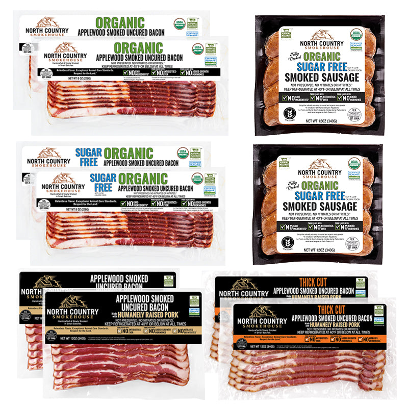Collection of North Country Smoked Bacon and Sausage packages on a white background