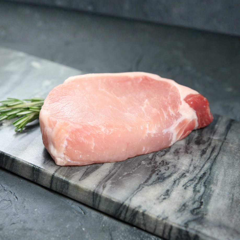 Duroc boneless pork chop on a marble slate
