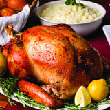 Roasted turkey with sides on a table