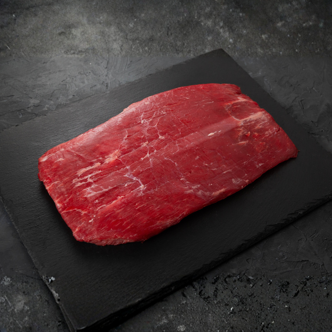 Flank steak on flat surface