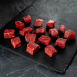 beef stew meat on a slate