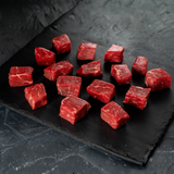 beef stew meat on a slate